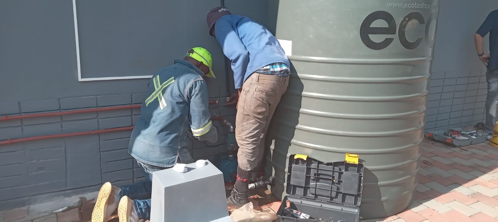 Water tank plumbing and booster pump connections